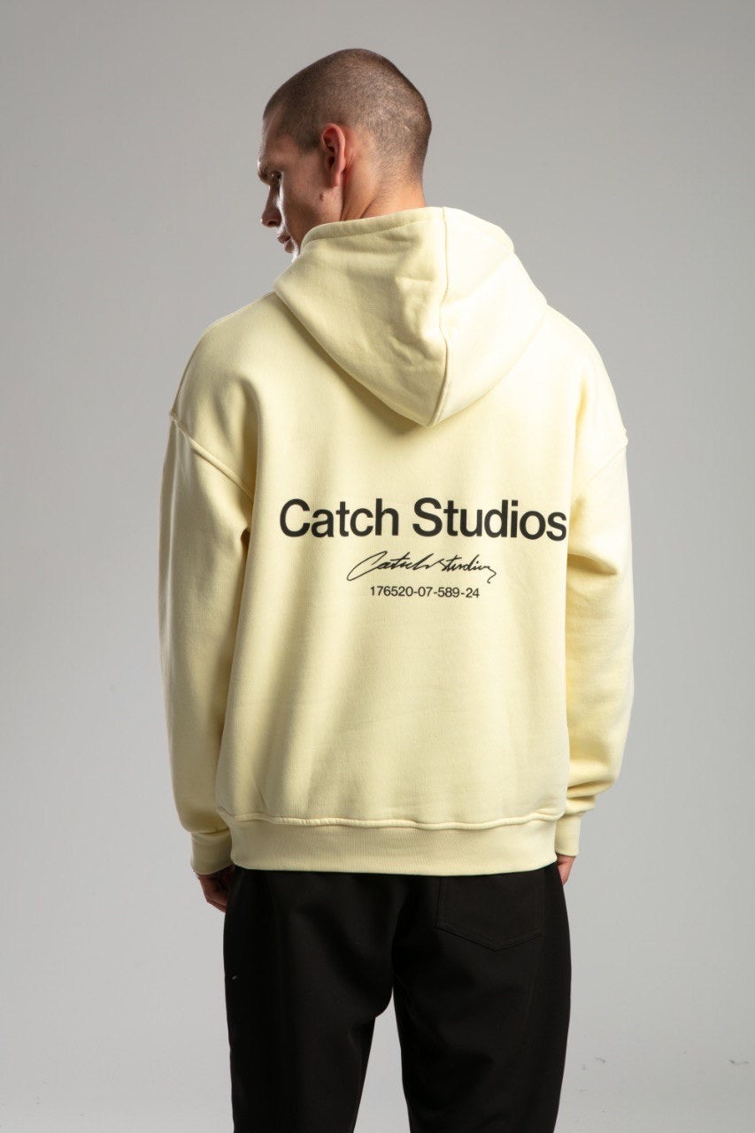 Hoodie Catch Studios Jaune